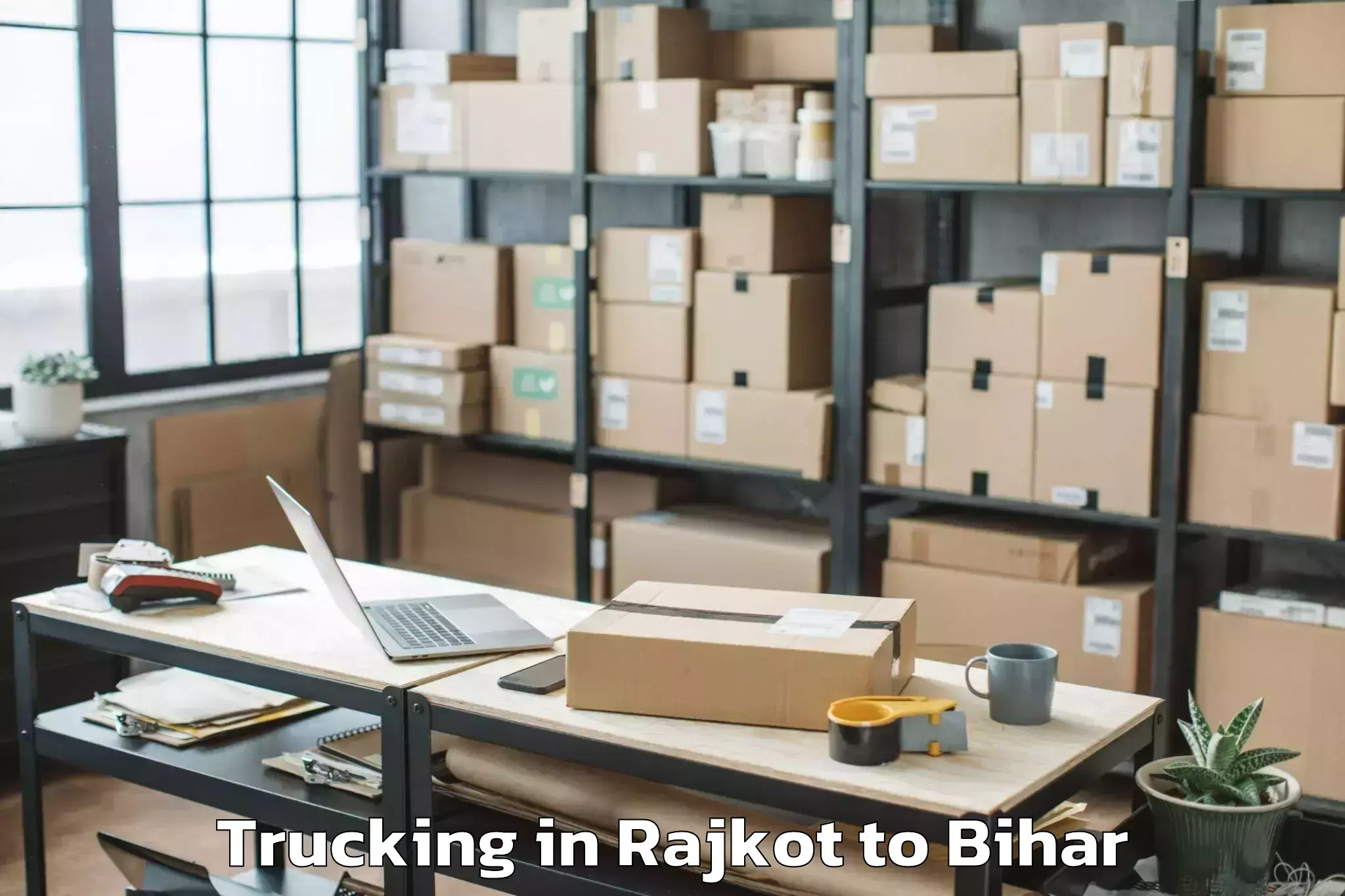 Quality Rajkot to Ghanshampur Trucking